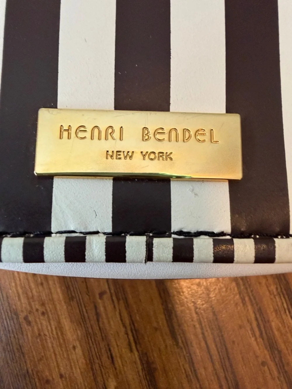 henri bendel approximately 4”